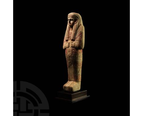 Ramesside Period, 19th-20th Dynasty, 1295-1077 BC. A carved limestone shabti with painted detailing to the eyes and costume, 