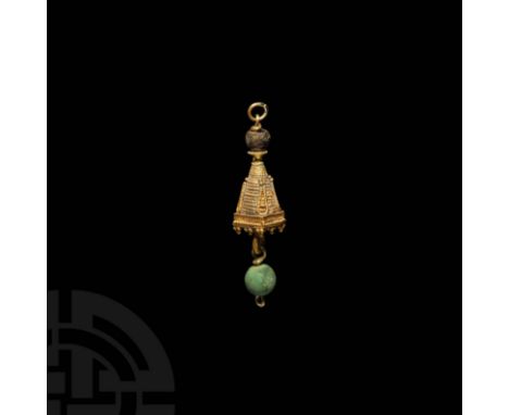 2nd-1st millennium BC. A gold pyramidal pendant with gold wire body, applied piriform cell to each corner, flange collar abov