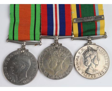 Group mounted as worn - Defence & War Medals, Cadet Forces Medal QE2 (Dei Gratia) with extra service bar, named to Act Wg Cdr