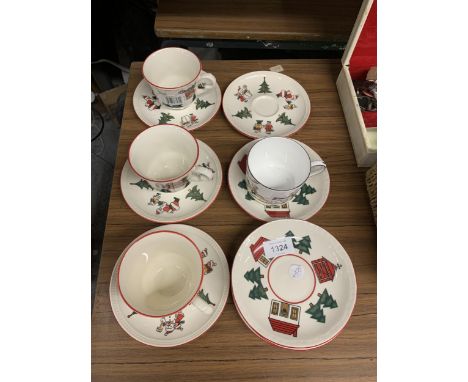 THREE MASON'S 'CHRISTMAS VILLAGE' CUPS, EIGHT SAUCERS AND A WEDGWOOD 'HUNTING SCENES' CUP 