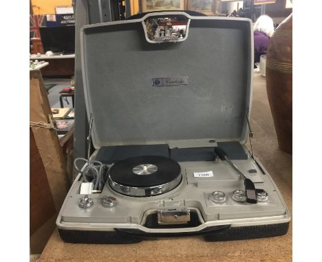 A VINTAGE PYE PORTABLE RECORD PLAYER IN A CASE 
