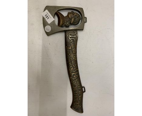 A METAL AXE WITH AN IMAGE OF GEORGE WASHINGTON, INSCRIBED 'WASHINGTON INAUGURATED PRESIDENT OF THE U. S. APR 30 1789' 