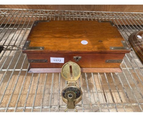 A VINTAGE WOODEN BOX AND A BRASS COMPASS 