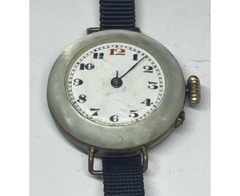 A MOTHER OF PEARL TRENCH STYLE WRIST WATCH A/F 