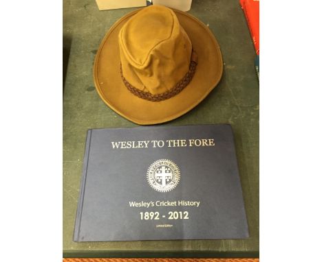 A WESLEY CRICKET BOOK AND HAT 