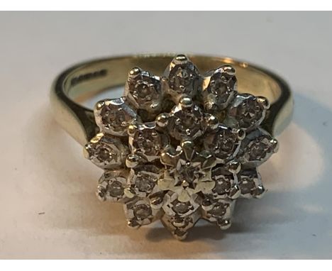 A 9 CARAT GOLD DIAMOND CLUSTER RING WITH PRESENTATION BOX SIZE K 