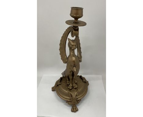 A VINTAGE BRASS SPHINX CAT CANDLESTICK, HEIGHT 34CM 