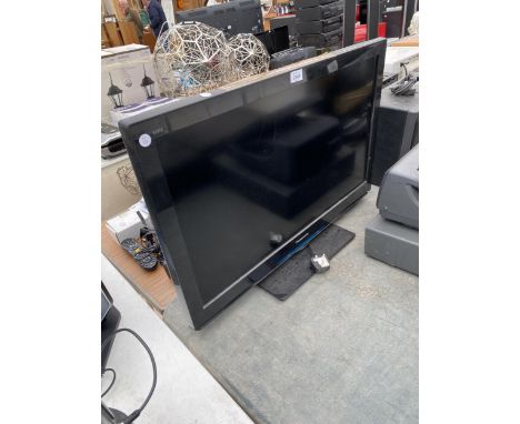 A PANSONIC 32" TELEVISION WITH REMOTE CONTROL AND USER MANUAL 