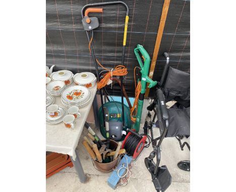 AN ASSORTMENT OF GARDEN TOOLS TO INCLUDE A HOVVER MOWER, A GRASS STRIMMER AND AN EXTENSION LEAD ETC 