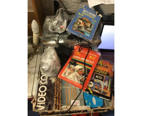 A VINTAGE ATARI GAMES CONSOLE 2600, JOYPADS, CONTROLLERS, POWER PACKS PLUS 6 GAMES - KUNG FU MASTER, ATLANTIS, SPACE INVADERS