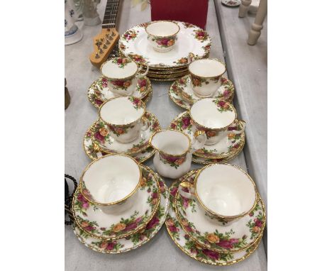 A ROYAL ALBERT 'OLD COUNTRY ROSES' TEASET TO INCLUDE DINNER PLATES, CUPS, SAUCERS, SIDE PLATES A CREAM JUG AND SUGAR BOWL 