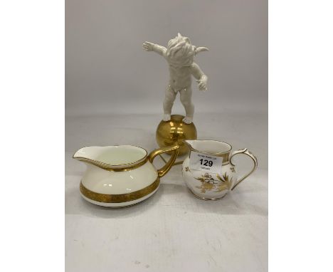 A GERMAN FIGURE OF A CHERUB ON A GILT ORB, SIGNED TO THE BASE AND IMPRESSED WITH THE NAME K. TUTTER, PLUS A MINTON JUG AND A 
