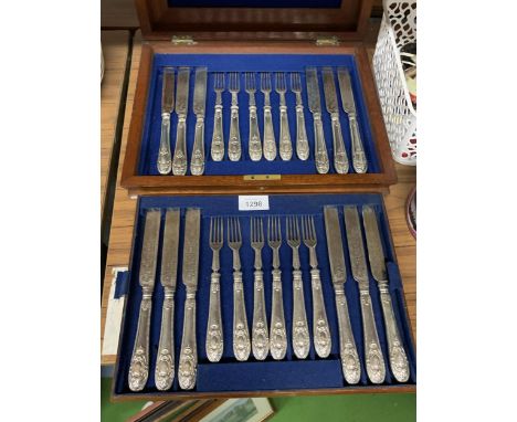 A MAHOGANY CASED KNIFE AND FORK SET 