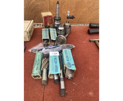 AN ASSORTMENT OF ENGINEERS TOOLS TO INCLUDE CLARKE MILLING BITS AND DRILL CHUCKS ETC 