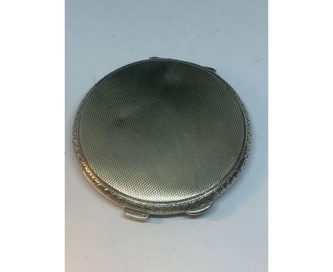 A HALLMARKED BIRMINGHAM SILVER COMPACT 