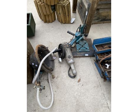 A BLACK AND DECKER DRILL AND DRILL STAND AND A BLACK AND DECKER GRINDER 