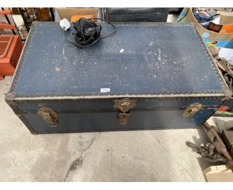 A VINTAGE TRAVEL TRUNK 
