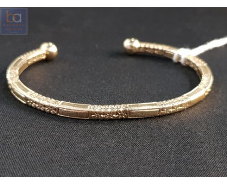 9 CARAT GOLD TORQUE BANGLE 28 GRAMS 
