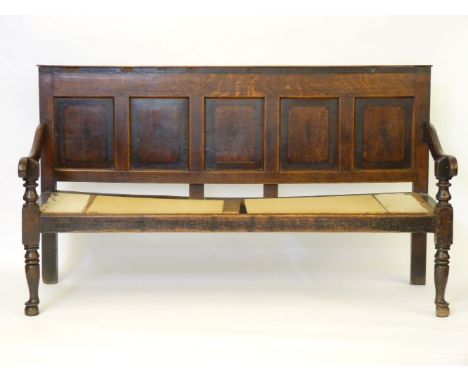 A George III oak and mahogany crossbanded settle, with five panel back, with hardwood seat, 186cm wide