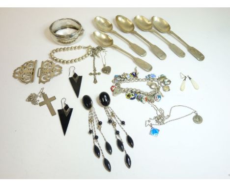 A silver Aesthetic Movement hinged bangle, a sterling silver charm bracelet with enamelled town or county charms, a silver be