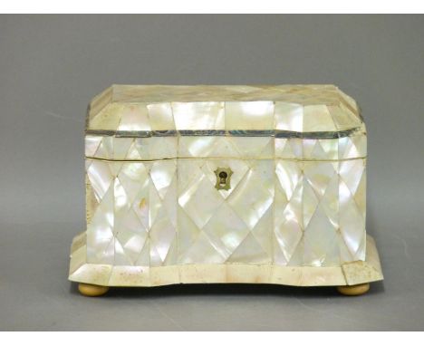 A Victorian mother of pearl and ivory twin compartment tea caddy, 13cm high