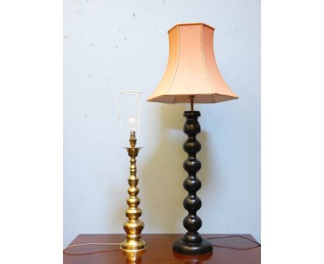 A modern table lamp and shade, with a black bobbin turned column, 95cm high overall, and a modern brass table lamp and shade