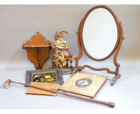 A Victorian walnut blotter, with oval porcelain portrait of a lady, a toilet mirror, Mr Punch door stop, wall bracket, etc