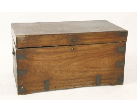 A camphor wood trunk, with brassed corners, straps and carrying handles