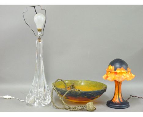 An Art Nouveau mottled glass plafonnier, in blue, red and yellow, 35.5cm diameter, a mottled table lamp, 29cm high, and a cle