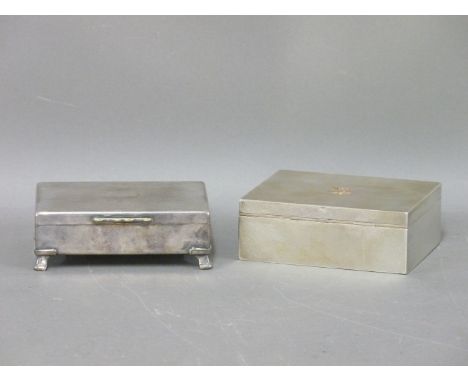 An engine turned table top cigarette box, retailed by Asprey, London, Chester 1916, 11.5cm, and a silver plated cigarette box