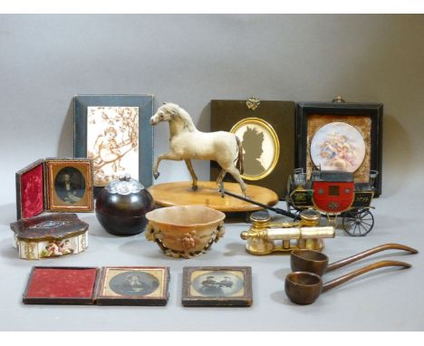 A box of interesting miscellanea, to include soapstone libation cup, 19th century toy horse on wheels, porcelain plaques, dag