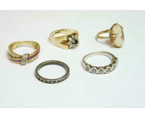 A 9ct gold ruby and diamond channel set ring, a 9ct gold sapphire and diamond ring, a gold cameo ring marked 9ct, a marcasite