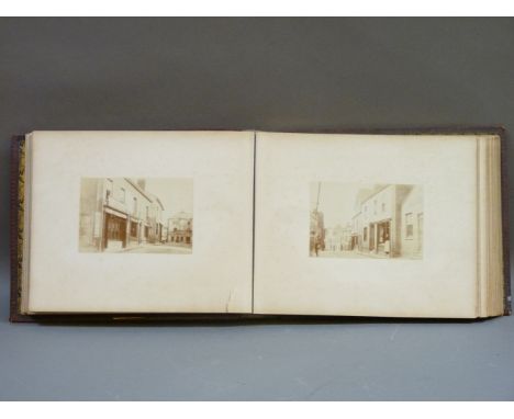 An album of photographs of Bishop's Stortford and East Hertfordshire, circa 1865, including a decorated arch in North Street 