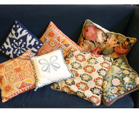 Seven tapestry and embroidered decorative cushions