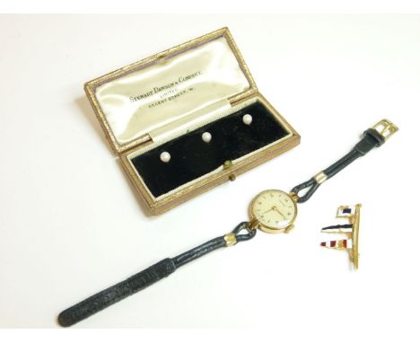 A ladies 9ct gold Vertex mechanical strap watch, a gold enamel burgee brooch marked Benzie Cowes 18ct, and a cased set of thr