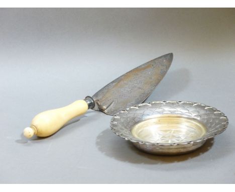 A Victorian silver trowel with ivory handle, marks rubbed, with presentation inscription, and a Mappin & Webb silver dish, Sh