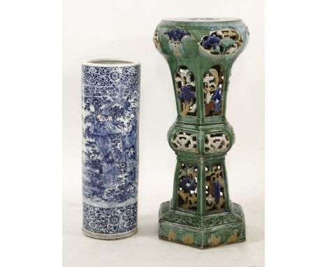 A Chinese pottery conservatory stand, with pierced decoration, 80cm high, and a blue and white stick stand