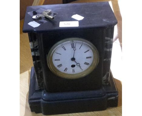 A Victorian slate mantle clock