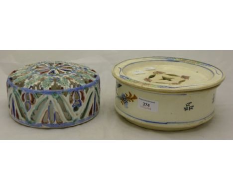 A Japanese pottery warmer plate and a pierced pottery dish cover/wall light