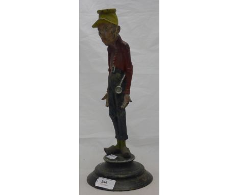 An early 20th century Dutch figural candlestick