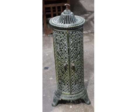 A Victorian green enamel cast iron burner