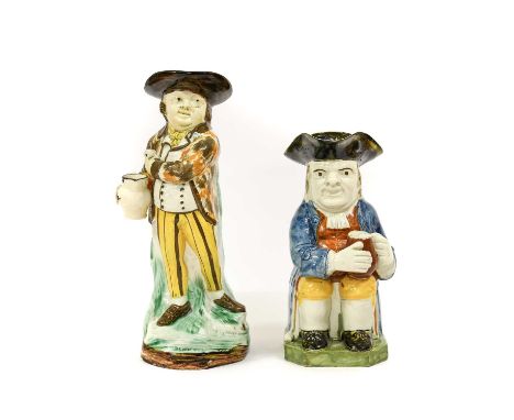 A Prattware Hearty Goodfellow Toby Jug, circa 1800, the standing figure holding a pipe in one hand, a jug in the other28.5cm 