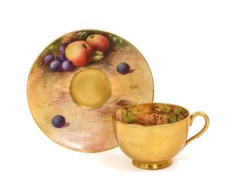 A Royal Worcester Porcelain Cup and Saucer, by Horace Price and George Moseley, 1930, painted with still lifes of fruit on a 