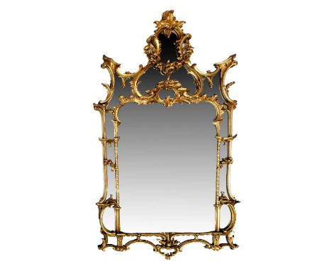 A George II-Style Carved Giltwood Pier Glass, 19th century, with original mercury plate, the mirror divided by acanthus scrol