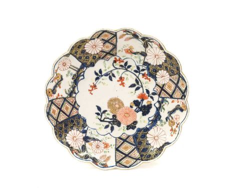 A Chelsea Porcelain Dish, circa 1755, of lobed circular form, painted in the Imari palette with a brocade pattern21cm diamete