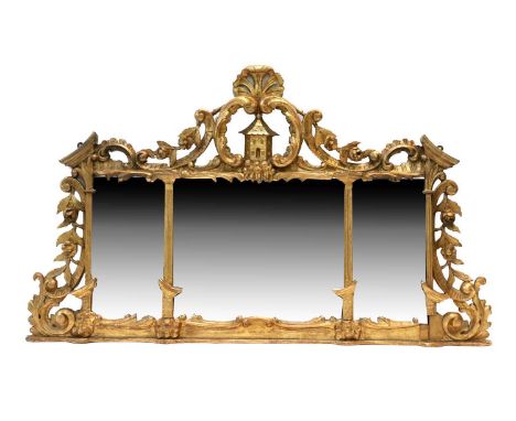 A 19th Century Carved Giltwood Rococo-Style Wall Mirror, the plain mercury plate within a C scroll floral-decorated frame, th