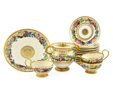 A Sèvres Porcelain Etrusque Tea Service, 1827, painted with a band of flowers within formal gilt foliate borders, stencilled 