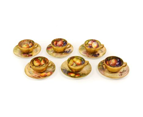 A Set of Six Royal Worcester Porcelain Cabinet Cups and Saucers, circa 1918, painted with still lifes of fruit on a mossy ban