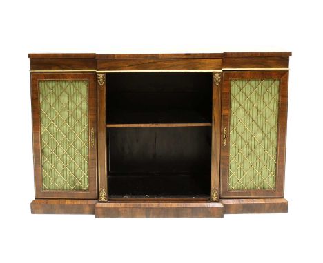 A Regency Rosewood and Brass-Inlaid Breakfront Dwarf Bookcase, early 19th century, with one adjustable shelf flanked by inlai