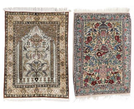 Qum Silk Prayer RugCentral Iran, circa 1960The ice blue field with hanging lamp beneath a cusped Mihrab enclosed by borders o